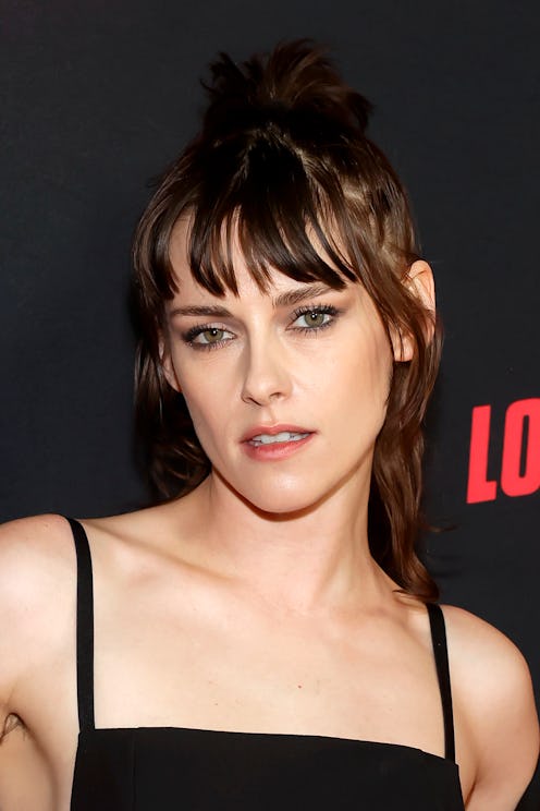 Kristen Stewart leather bralette Thom Browne suspenders