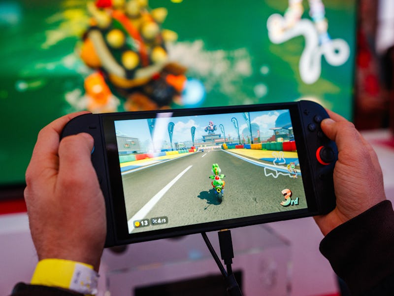 A guest plays Mariokart World with the new Nintendo Switch 2 video-game console system of Japanese v...