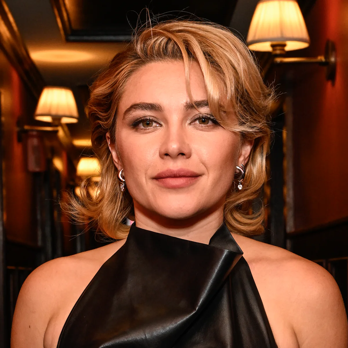Florence Pugh's Loewe Leather Dress Had A Huge Thigh Slit Florence Pugh's Loewe Leather Dress Had A Huge Thigh Slit