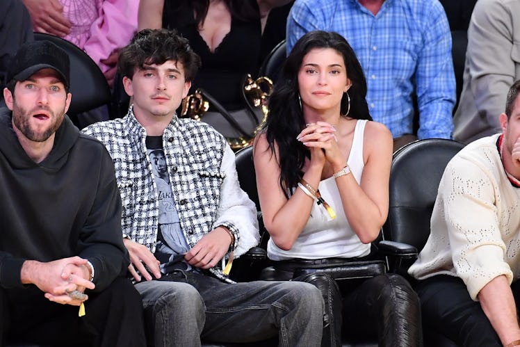 LOS ANGELES, CALIFORNIA - APRIL 30: Timothee Chalamet and Kylie Jenner attend a basketball game betw...
