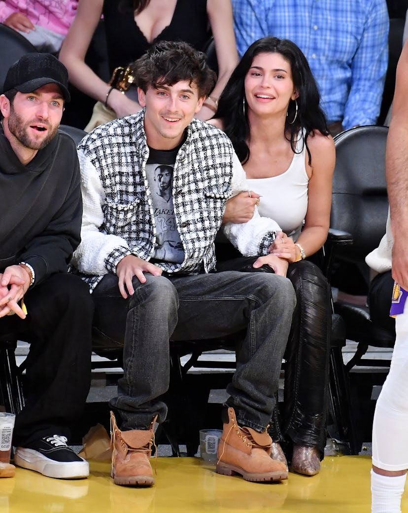 LOS ANGELES, CALIFORNIA - APRIL 30: Timothee Chalamet and Kylie Jenner attend a basketball game betw...