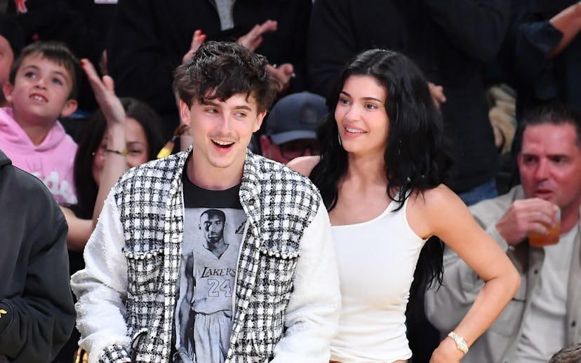 LOS ANGELES, CALIFORNIA - APRIL 30: Timothee Chalamet and Kylie Jenner attend a basketball game betw...