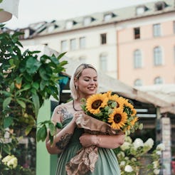 Your tarot card for Tuesday May 13, 2025 is the Queen of Wands.