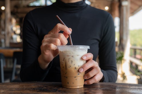 Iced coffee with milk is made using freshly brewed coffee with fat milk, a sweet, simple syrup, and ...