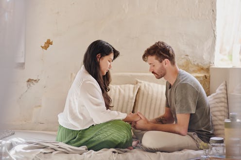 House, holding hands and couple with prayer, worship and respect with religion, hope and comfort. Pe...