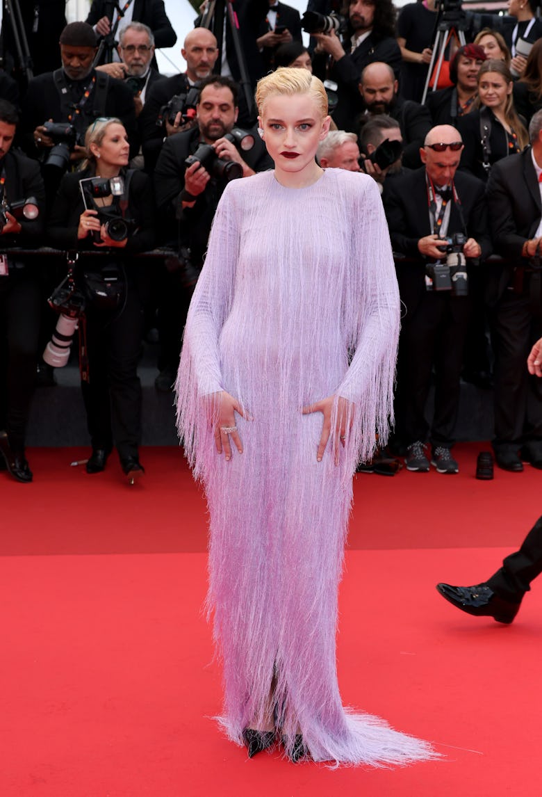Julia Garner attends the "Eddington" red carpet at the 78th annual Cannes Film Festival at Palais de...
