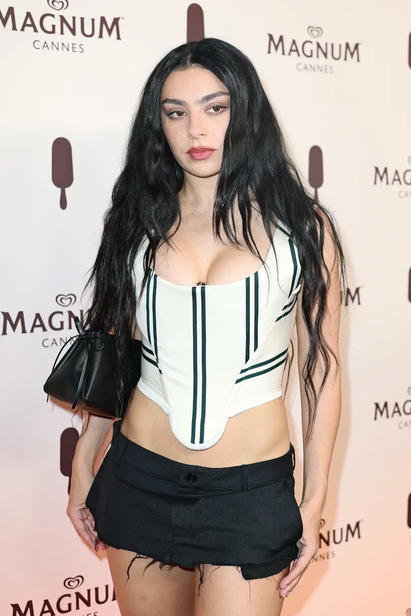 Charli XCX attends the Magnum Party Red Carpet at the 78th annual Cannes Film Festival at Magnum Bea...