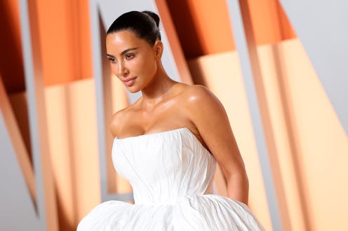 Kim Kardashian wore an exposed bra look.