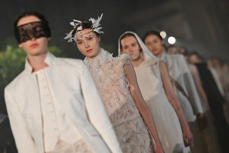 Models walk the runway during the Dior Women Cruise 26 fashion collection show at Villa Albani Torlo...