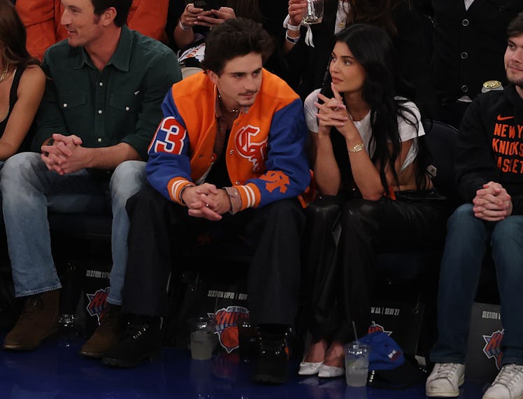 Timothée Chalamet and Kylie Jenner look on from court side during the first quarter in Game 5 of the...