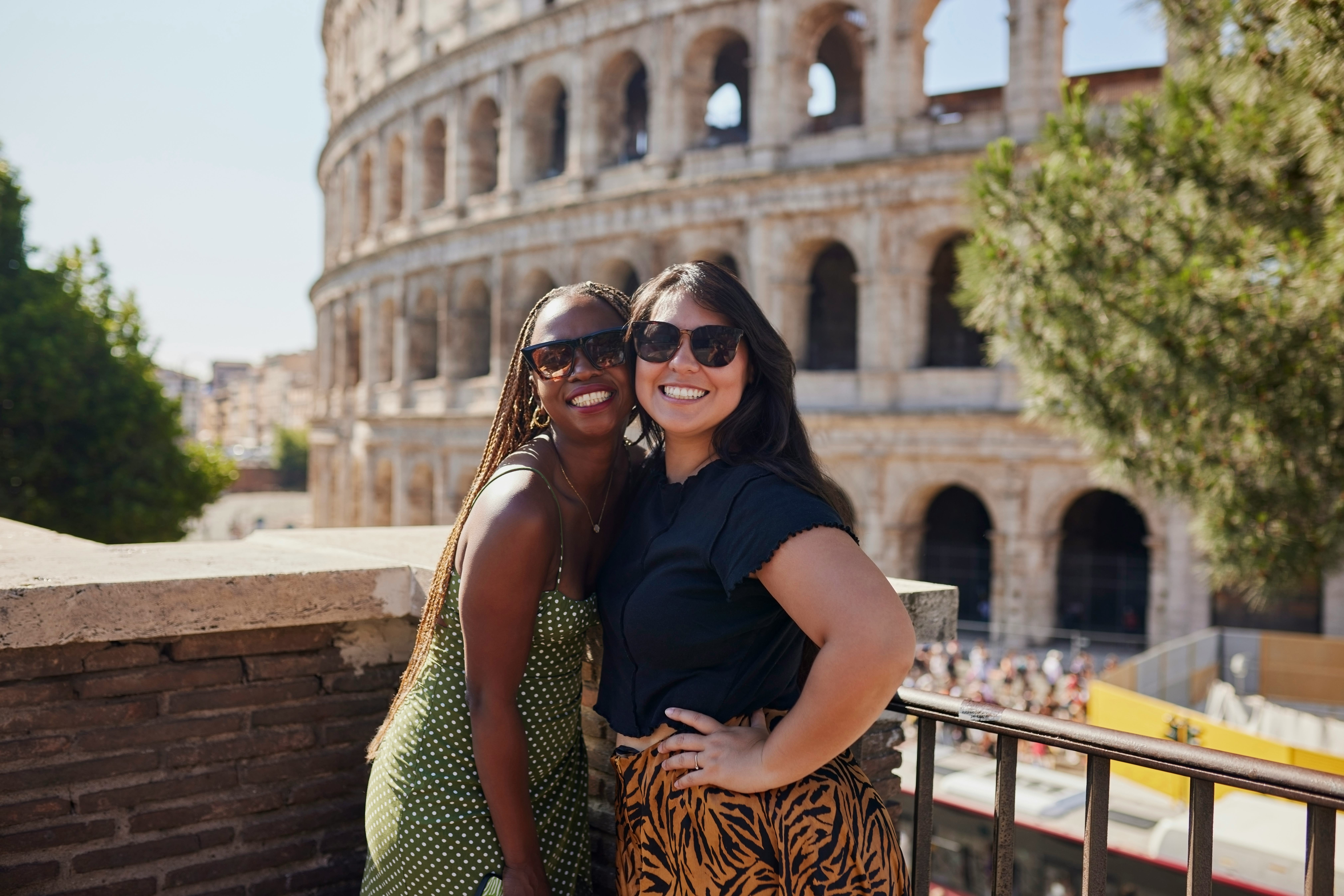 Holiday, women or travel with sunglasses in city for weekend trip, summer adventure or bonding in Ro...