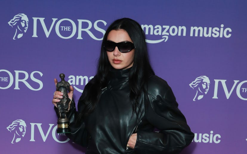 LONDON, ENGLAND - MAY 22: Charli XCX, winner of the Songwriter of the Year Award, poses in the winne...