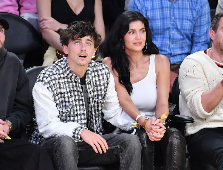 LOS ANGELES, CALIFORNIA - APRIL 30: Timothee Chalamet and Kylie Jenner attend a basketball game betw...