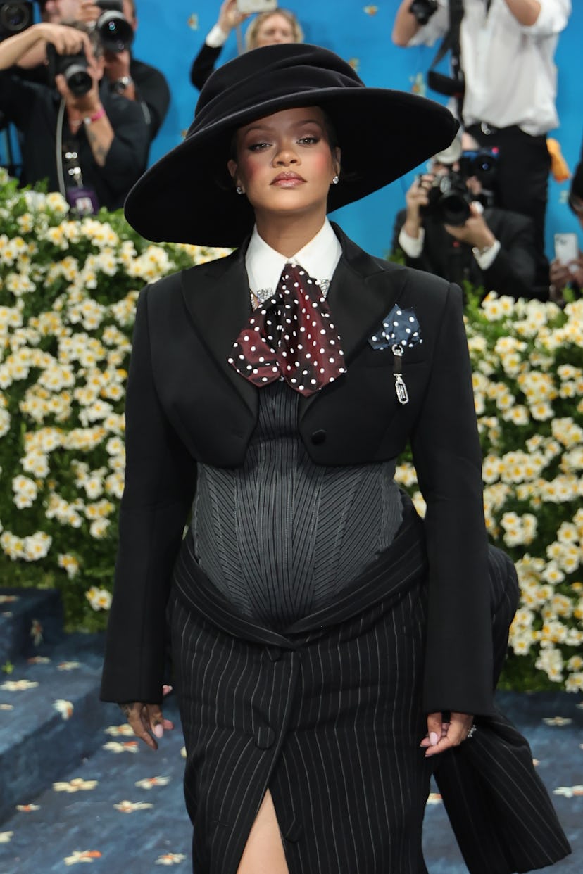NEW YORK, NEW YORK - MAY 05: Rihanna attends the 2025 Met Gala Celebrating "Superfine: Tailoring Bla...