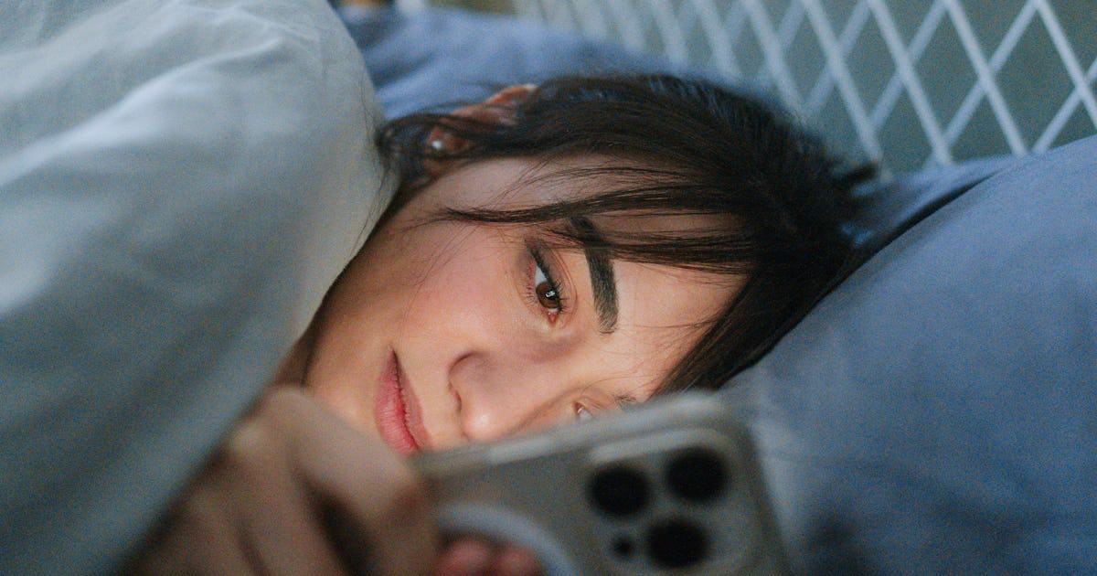These 3 Zodiac Signs Can't Help Scrolling On Their Phones Until 2 A.M.