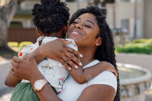 Single mother with her daughter at the park.