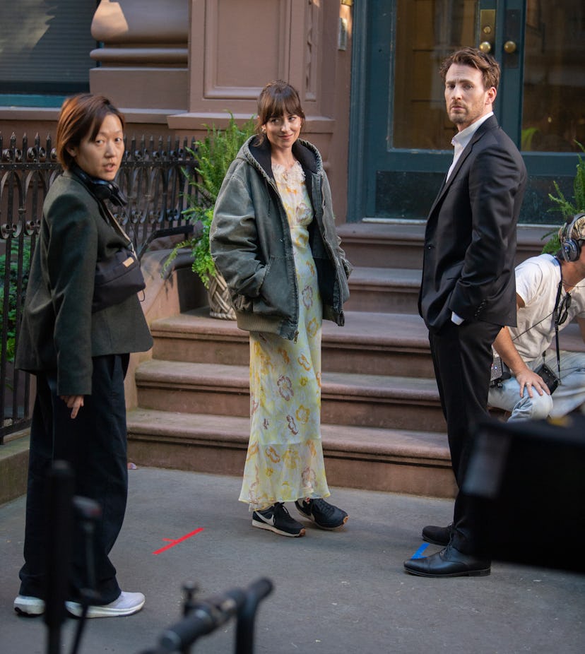 NEW YORK, NY - MAY 31: Celine Song, Dakota Johnson and Chris Evans are seen on the set of "The Mater...