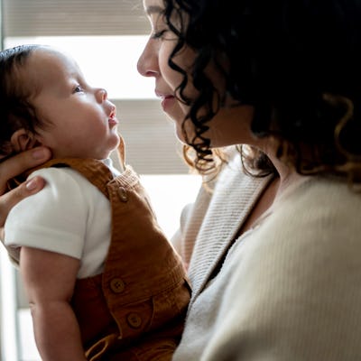 Mother cares for infant son