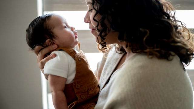 Mother cares for infant son