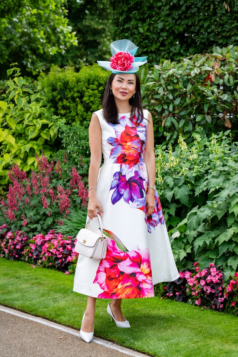 Liubor Clark (wearing a Karen Millen dress and Marta Holod hat) attends the 1st day of Royal Ascot o...