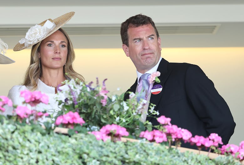Harriet Sperling and Peter Phillips smile as they attend day one of Royal Ascot at Ascot Racecourse ...
