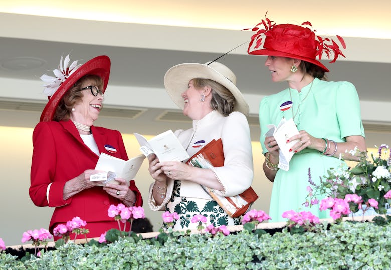 Lady Sarah Keswick, Laura Lopes and Lady Joanna Morton Jack laugh as they attend day one of Royal A...