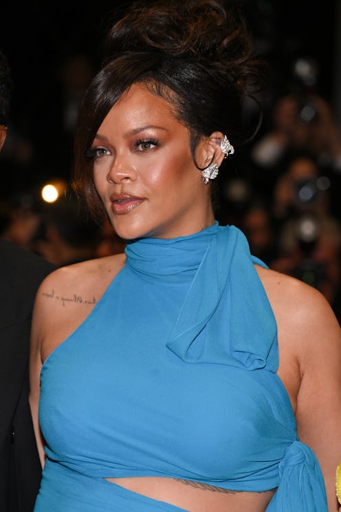 CANNES, FRANCE - MAY 19: Rihanna attends the "Highest 2 Lowest" red carpet at the 78th annual Cannes...