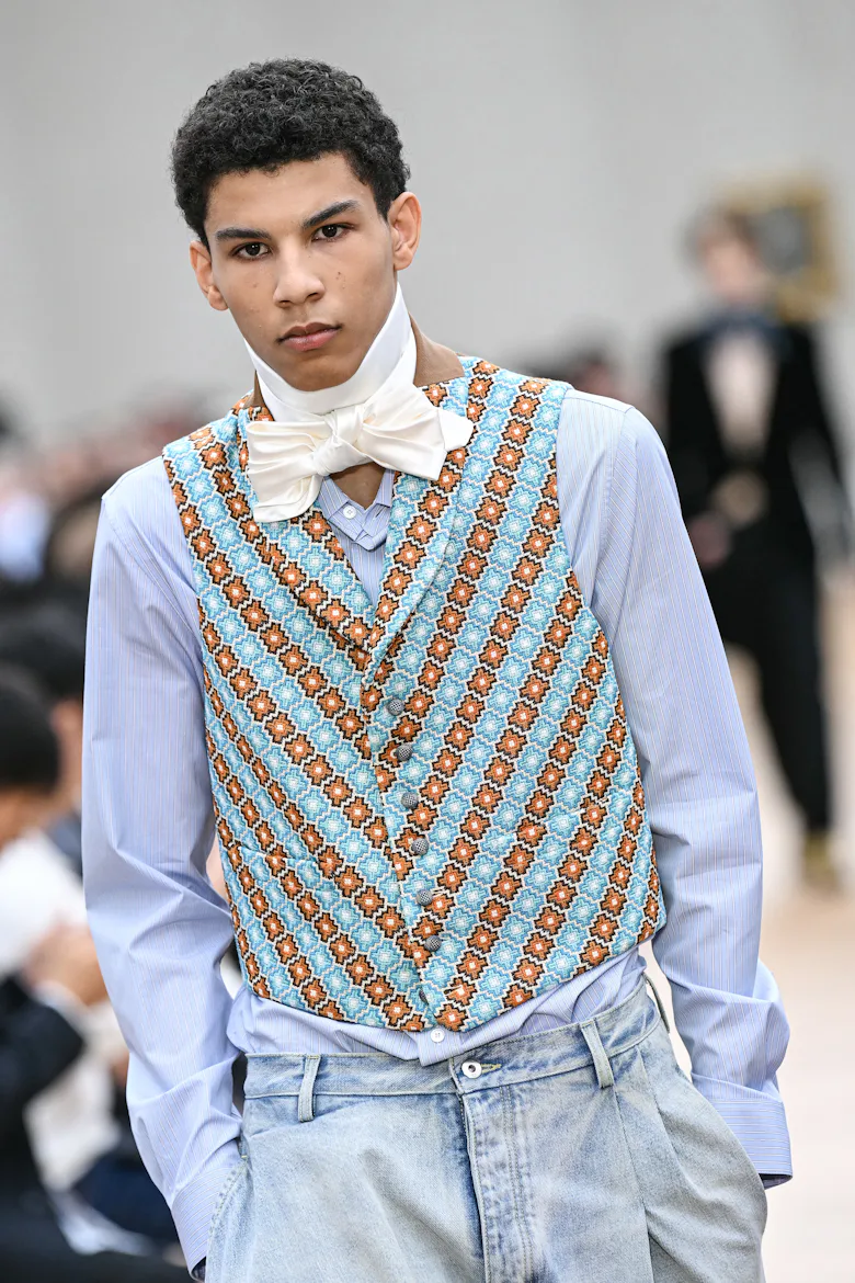 A model presents a creation by Dior Homme for the Menswear Ready-to-wear Spring-Summer 2026 collecti...