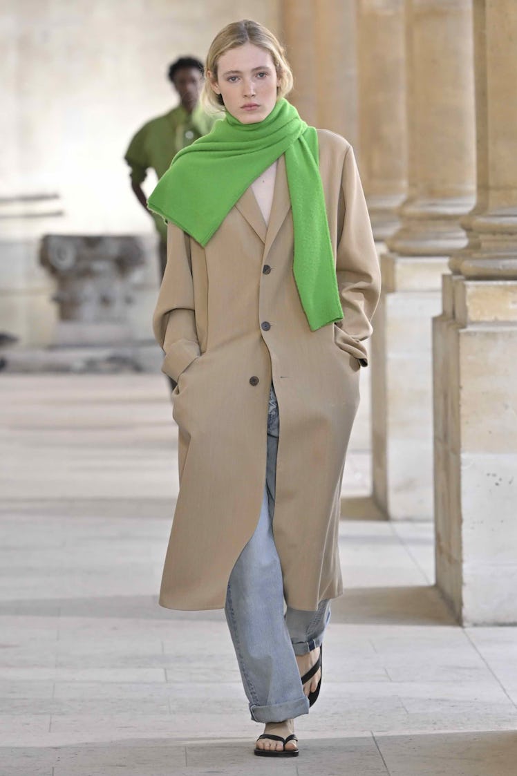 PARIS, FRANCE - JUNE 24: A model walks the runway during the Auralee Ready to Wear Spring/Summer 202...