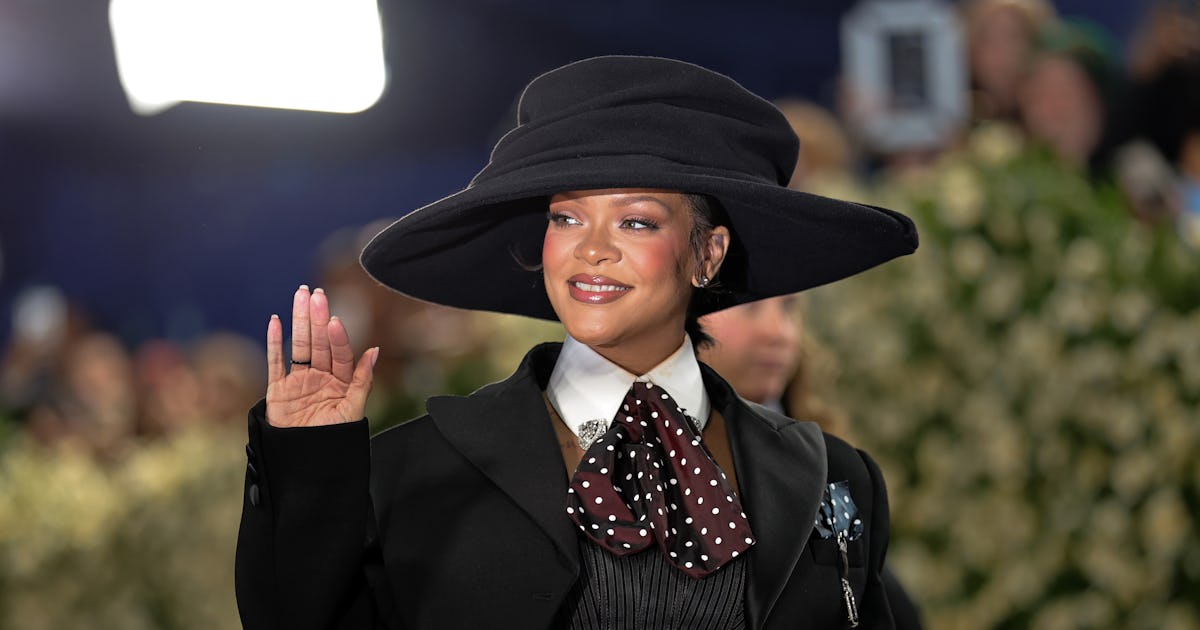 Rihanna Spent PFW Baring Her Baby Bump In A Strappy Cutout Dress & More Daring Looks