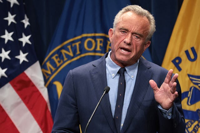HHS Secretary Robert Kennedy speaks at a podium.