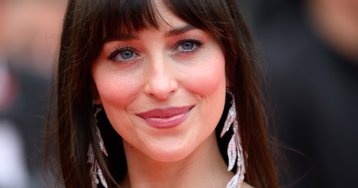 Dakota Johnson's Cleavage-Baring Skirt Suit Had Near-J.Lo Levels Of Plunge