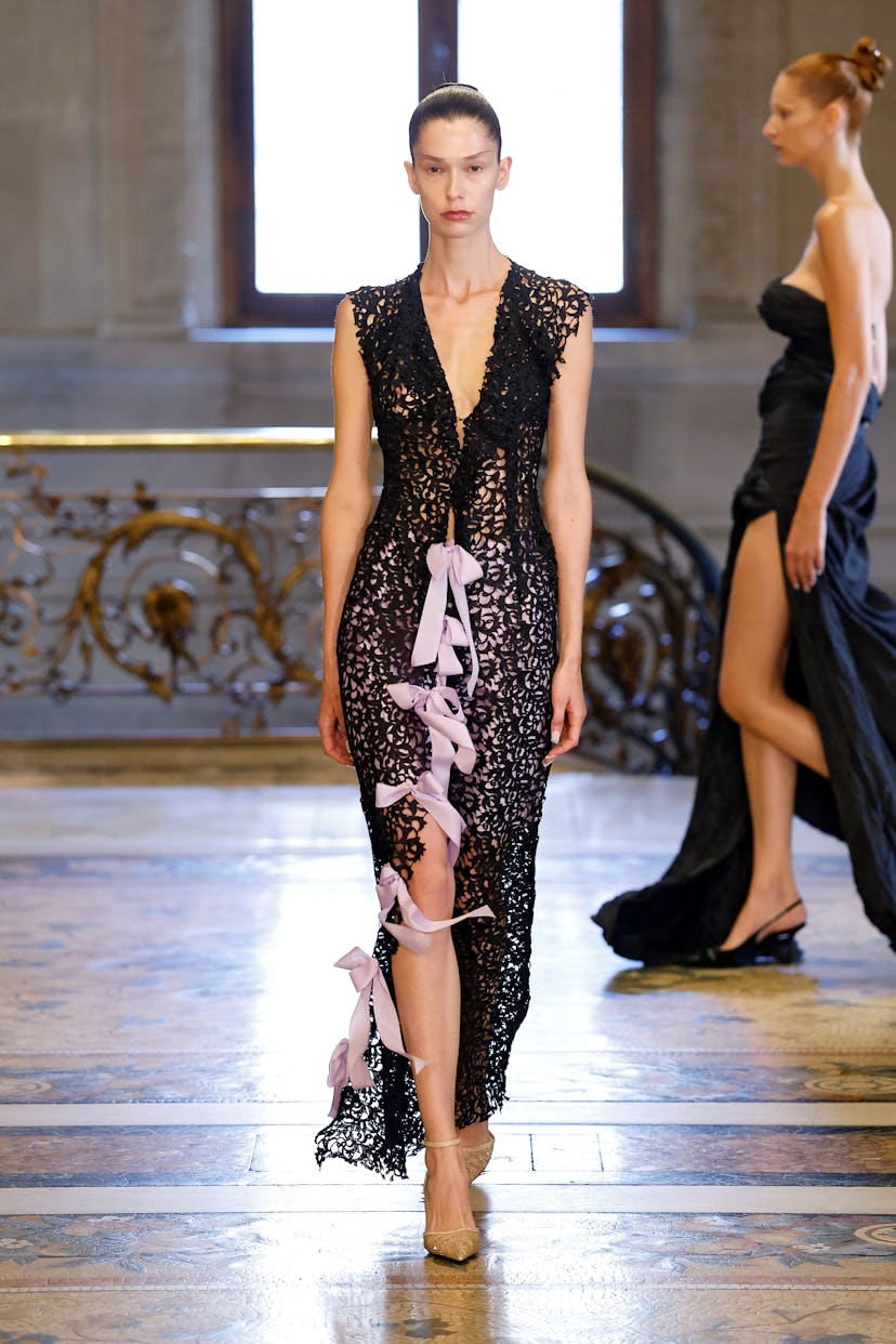 A model walks the runway during the Peet Dullaert Haute Couture Fall/Winter 2025/2026 show as part o...