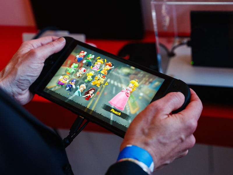 A guest chooses characters on Mariokart World as he plays with the new Nintendo Switch 2 video-game ...