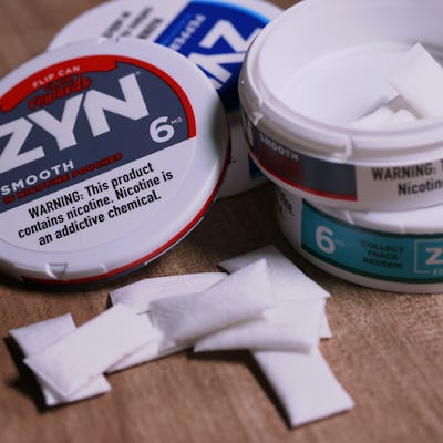 NEW YORK, NEW YORK - JANUARY 29: In this photo illustration, ZYN nicotine cases and pouches are seen on a table on January 29, 2024 in New York City. Sen. Chuck Schumer (D-NY) is calling for federal action on ZYN, a popular nicotine pouch in the United States. The senator is asking the FTC and FDA to investigate the companies marketing and the health effects of the nicotine pouch. (Photo Illustration by Michael M. Santiago/Getty Images)