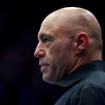 NEWARK, NEW JERSEY - JUNE 07: Joe Rogan looks on during UFC 316 at the Prudential Center on June 07, 2025 in Newark, New Jersey. (Photo by Elsa/Getty Images)