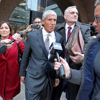 Varsity Blues mastermind William Rick Singer leaves the Moakley Courthouse after being sentenced to 3.5 years in jail on January 4, 2023.