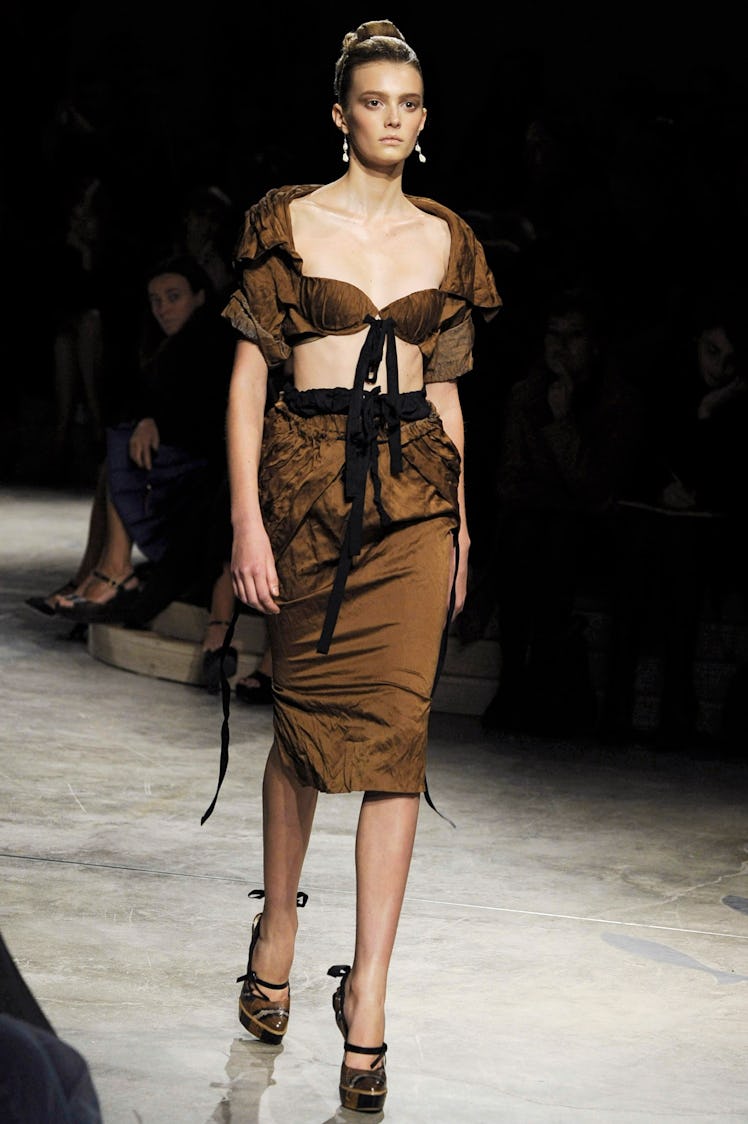 MILAN, ITALY - SEPTEMBER 23:  (UK OUT) A model walks the runway during the Prada show part of Milan ...