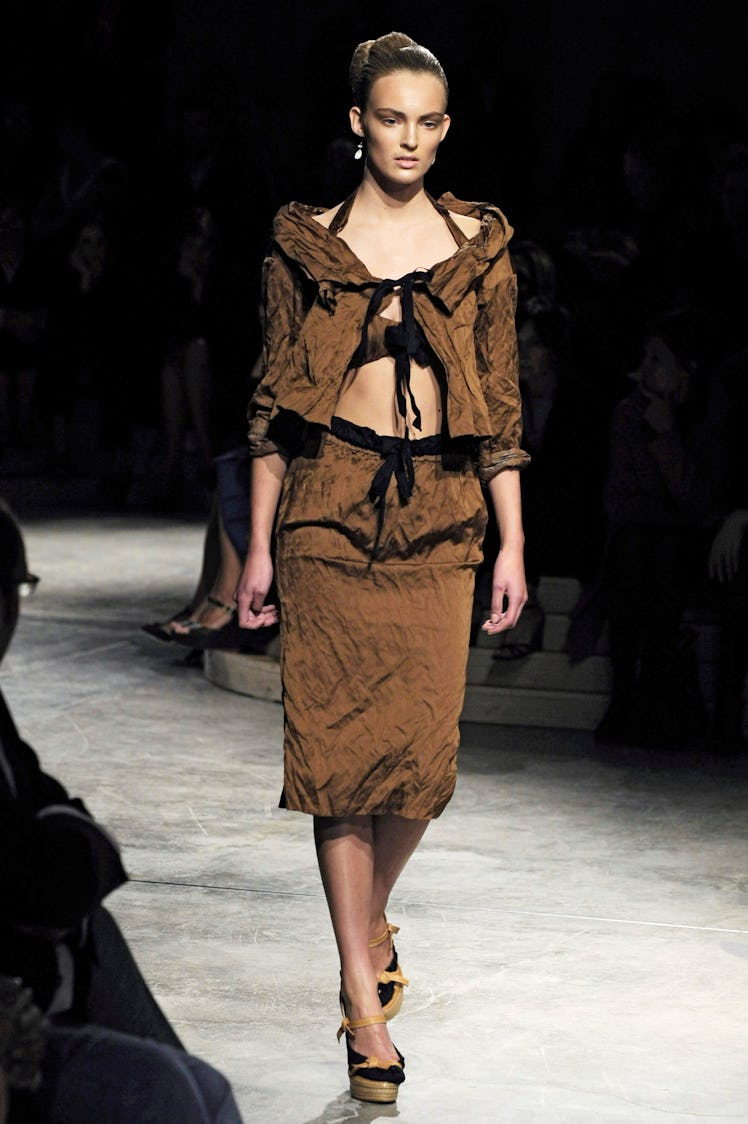 MILAN, ITALY - SEPTEMBER 23:  (UK OUT) A model walks the runway during the Prada show part of Milan ...