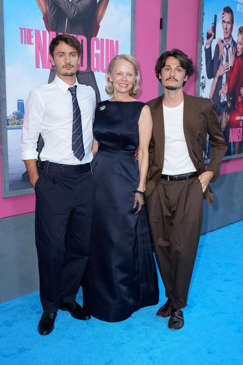 NEW YORK, NEW YORK - JULY 28: (L-R) Brandon Thomas Lee, Pamela Anderson and Dylan Jagger Lee attend ...