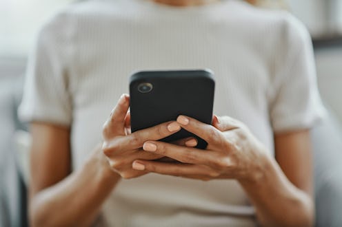Home woman hands, social media and phone contact, communication and smartphone technology in living ...