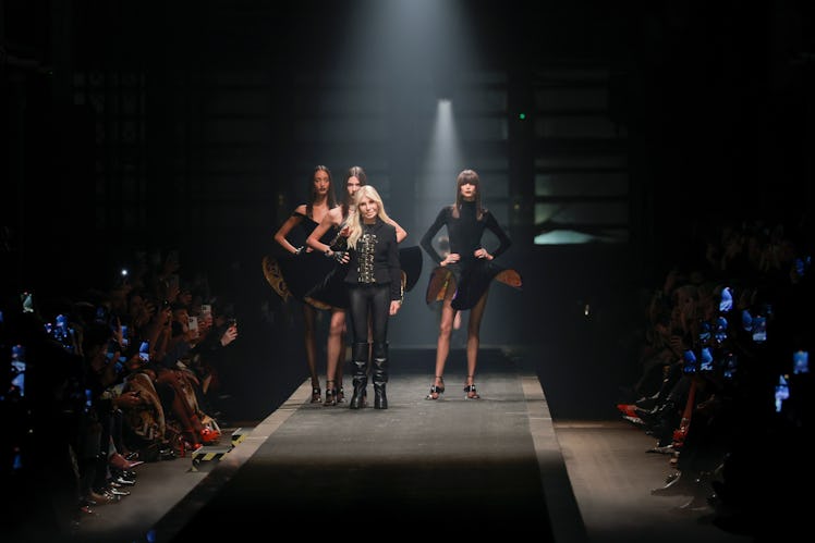 MILAN, ITALY - February  2025
(L-R) A model is seen on the catwalk at the Versace fashion show, duri...