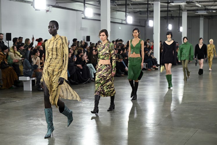 LONDON, ENGLAND - FEBRUARY 19: Models walk the runway at the KNWLS show during London Fashion Week F...