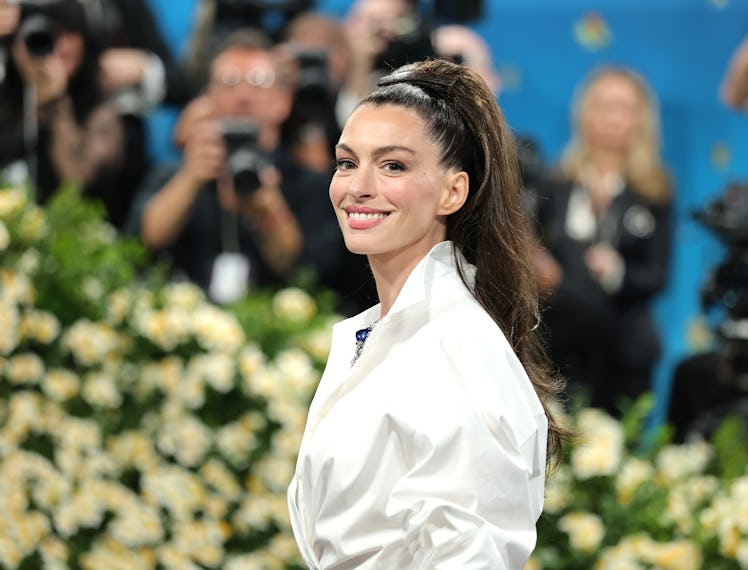 NEW YORK, NEW YORK - MAY 05: Anne Hathaway attends the 2025 Met Gala Celebrating "Superfine: Tailori...