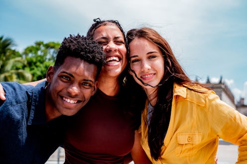 Portrait of young friends outdoors