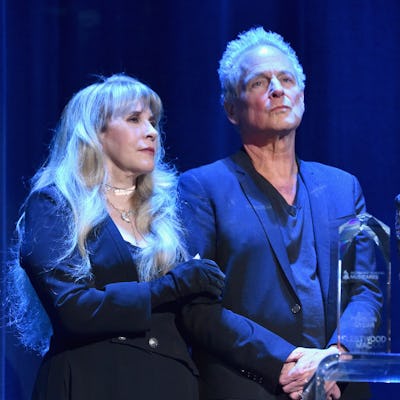 NEW YORK, NY - JANUARY 26: Honorees Stevie Nicks (L) and Lindsey Buckingham of music group Fleetwood Mac accept the MusiCares Person of the Year award onstage during MusiCares Person of the Year honoring Fleetwood Mac at Radio City Music Hall on January 26, 2018 in New York City. (Photo by Lester Cohen/Getty Images for NARAS)