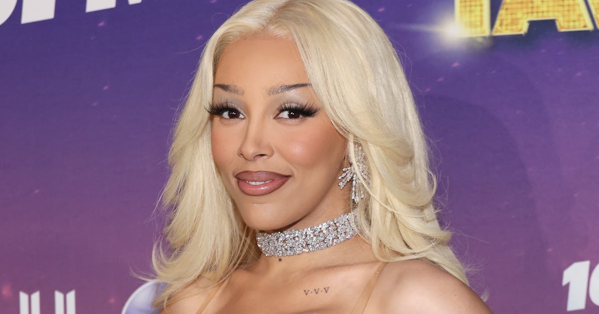 Doja Cat Wore Lingerie & A Plunging Mini In Her New Music Video