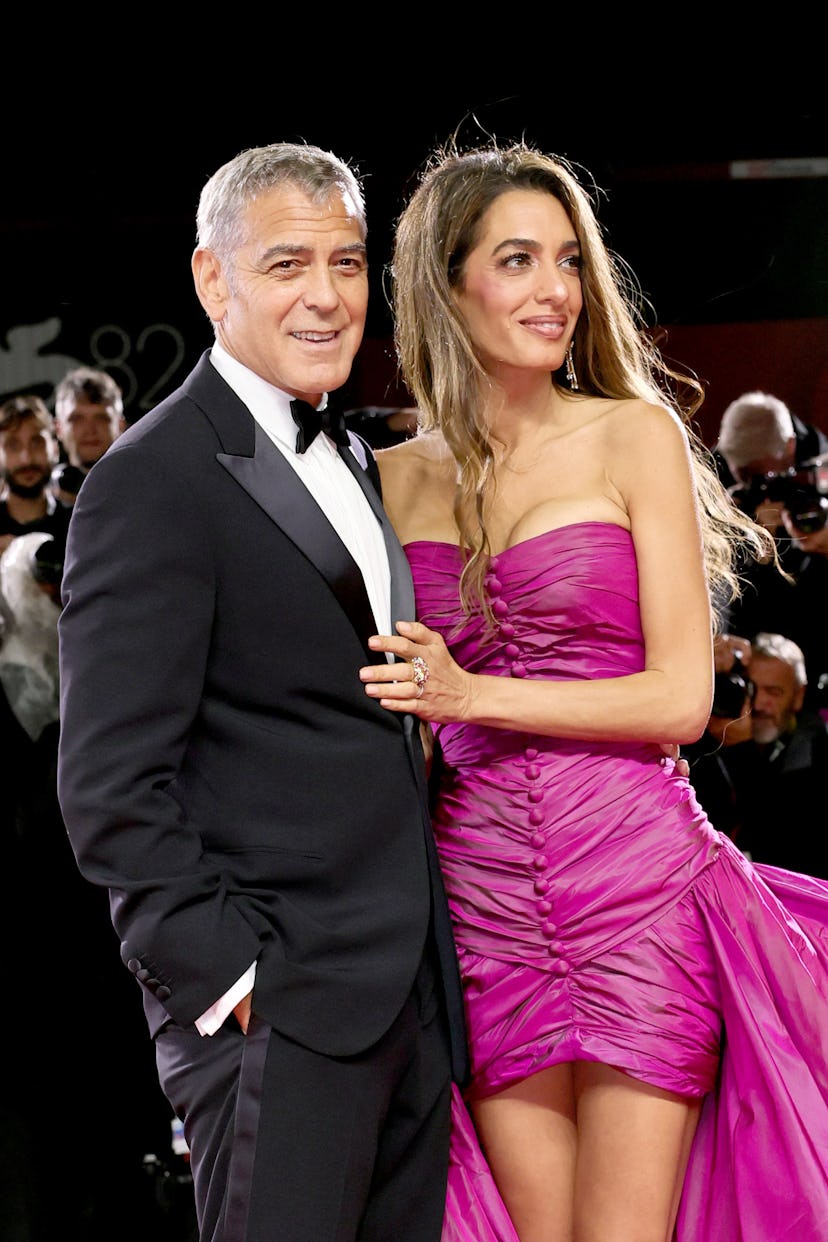 George Clooney and Amal Clooney attend the "Jay Kelly" red carpet during the 82nd Venice Internation...