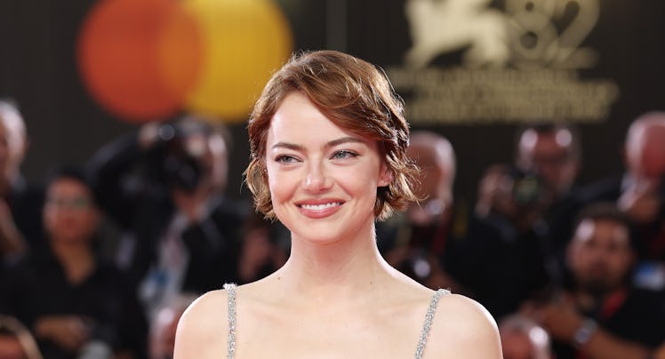 VENICE, ITALY - AUGUST 28: Emma Stone attends the "Bugonia" red carpet during the 82nd Venice Intern...