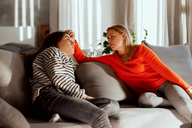 A mother talks with her depressed teenage girl.